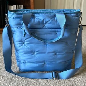 Baby blue handbag by Laundry. Brand new, never used. Soft material.